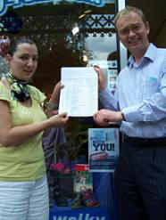 Pamela Bissland handing petition to Tim Farrom MP