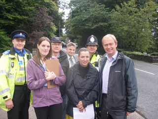 Front:  PCSO Scott Livett, Victoria Upton, Pamela Bissland, Tim Farron MP.  Back: Adrian Faulkner, Roger Mallett, Sgt Ken Jewell.